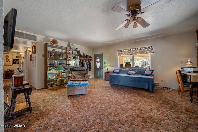 1051 Dusty Ln, Show Low, AZ 85901 - living room featuring a ceiling fan, a textured ceiling, and carpet