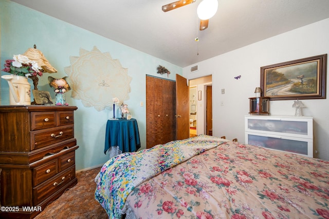 1051 Dusty Ln, Show Low, AZ 85901 - bedroom with a closet, carpet flooring, and ceiling fan