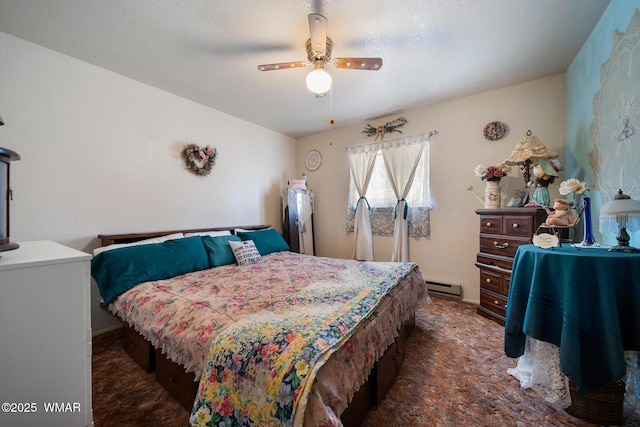 1051 Dusty Ln, Show Low, AZ 85901 - bedroom featuring baseboard heating, carpet flooring, and ceiling fan