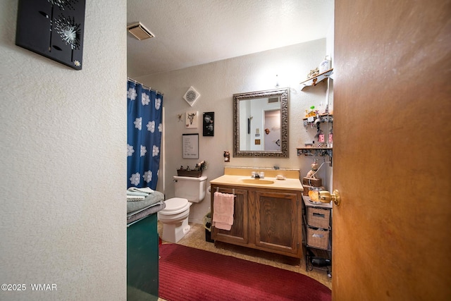 1051 Dusty Ln, Show Low, AZ 85901 - full bathroom with toilet, vanity, a textured wall, and a shower with shower curtain