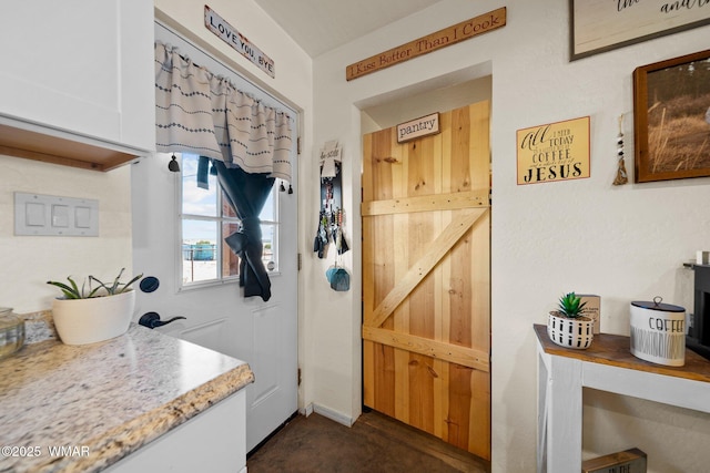 3036 W Plum Blossom Ln, Snowflake, AZ 85937 - doorway to outside featuring concrete flooring