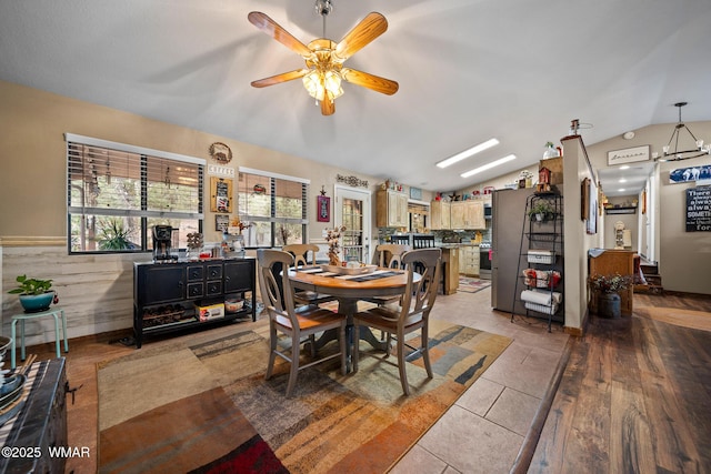 6711 Bandido Way, Show Low, AZ 85901 - dining space featuring healthy amount of natural light, lofted ceiling, a skylight, ceiling fan, and light tile patterned flooring