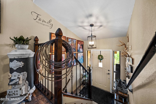 6711 Bandido Way, Show Low, AZ 85901 - entrance foyer with a textured wall and vaulted ceiling