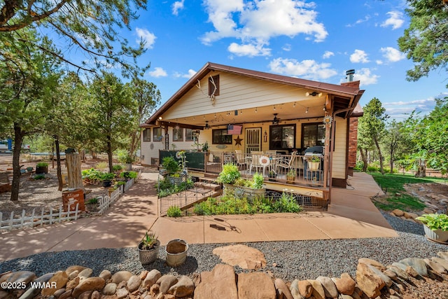 6711 Bandido Way, Show Low, AZ 85901 - view of front of property with a vegetable garden and a ceiling fan