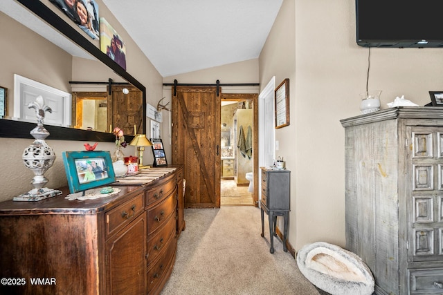 6711 Bandido Way, Show Low, AZ 85901 - hall with a barn door, light carpet, and lofted ceiling