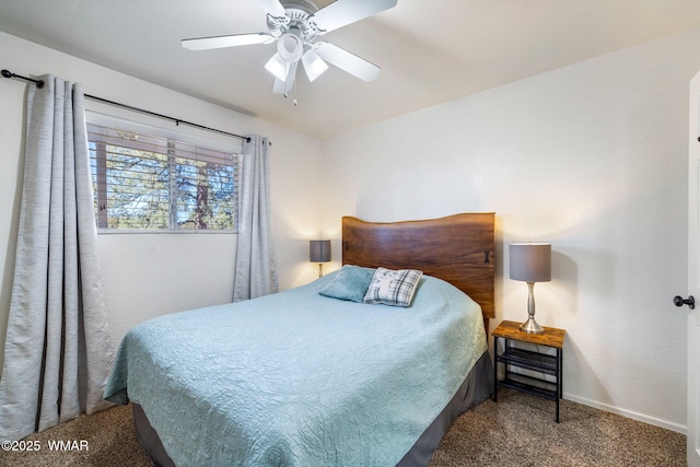 bedroom with carpet, a ceiling fan, and baseboards