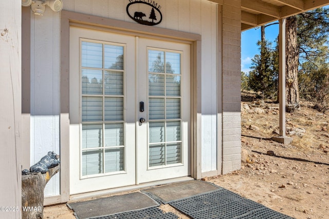 property entrance featuring french doors