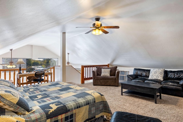 bedroom featuring light carpet, vaulted ceiling, and a textured ceiling