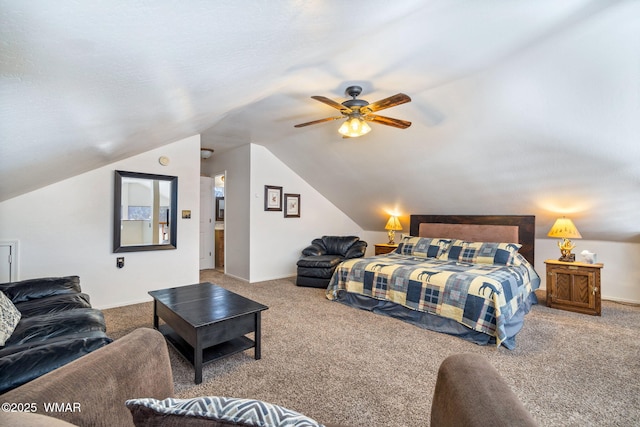 carpeted bedroom with ceiling fan, baseboards, and vaulted ceiling