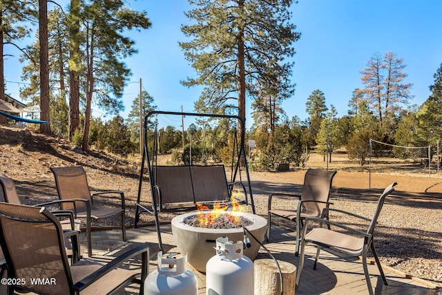 view of patio featuring a fire pit