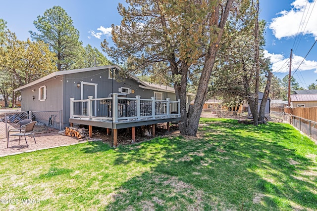 back of property with a deck