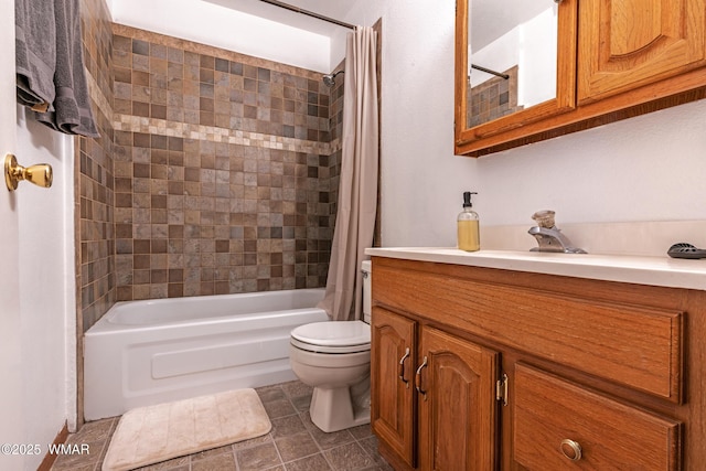 full bath featuring toilet, shower / bath combo, tile patterned floors, and vanity