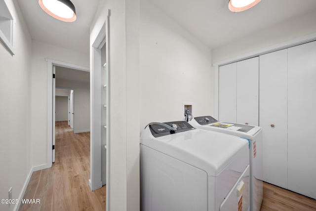1259 S Penrod Dr, Pinetop, AZ 85935 - washroom with washing machine and dryer and light wood-style flooring