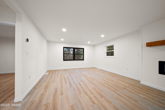 1259 S Penrod Dr, Pinetop, AZ 85935 - unfurnished living room with light wood-style flooring and recessed lighting