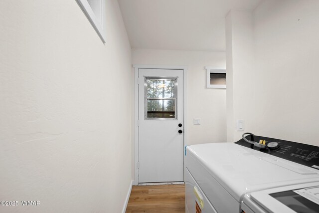 1259 S Penrod Dr, Pinetop, AZ 85935 - laundry area with washing machine and clothes dryer and light wood-style floors