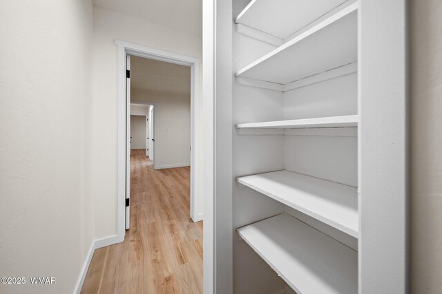 1259 S Penrod Dr, Pinetop, AZ 85935 - hallway featuring light wood finished floors and baseboards