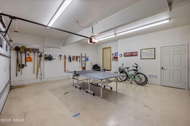 3530 Soaring Eagle Way, Pinetop, AZ 85935 - recreation room with a garage and speckle patterned floor