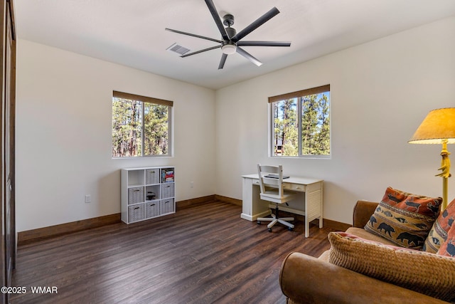office with plenty of natural light, wood finished floors, a ceiling fan, and baseboards