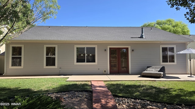 1050 E Jefferson St, Snowflake, AZ 85937 - rear view of house with a patio and a yard