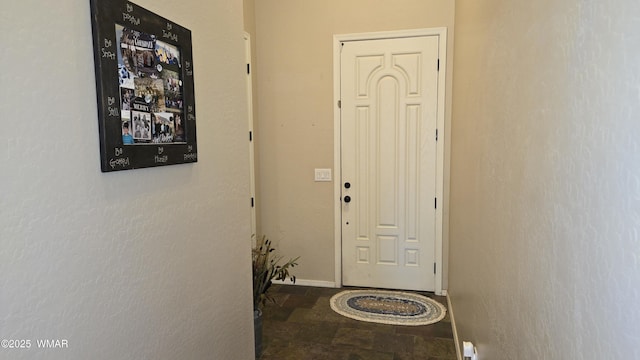 1050 E Jefferson St, Snowflake, AZ 85937 - doorway to outside featuring baseboards
