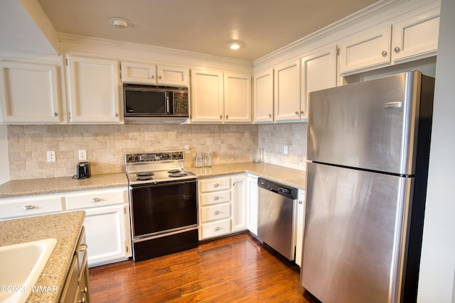 kitchen featuring backsplash, white cabinetry, stainless steel appliances, and dark wood-style flooring