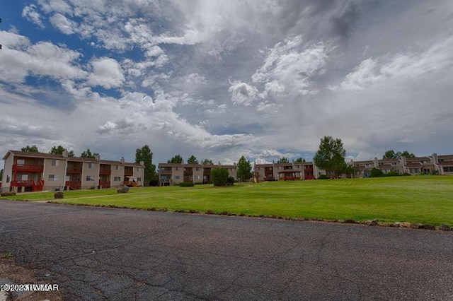 view of road with a residential view