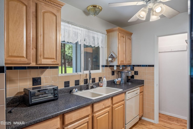 38684 State Route 373, Greer, AZ 85927 - kitchen featuring dishwasher, dark countertops, light wood finished floors, a ceiling fan, and light brown cabinets