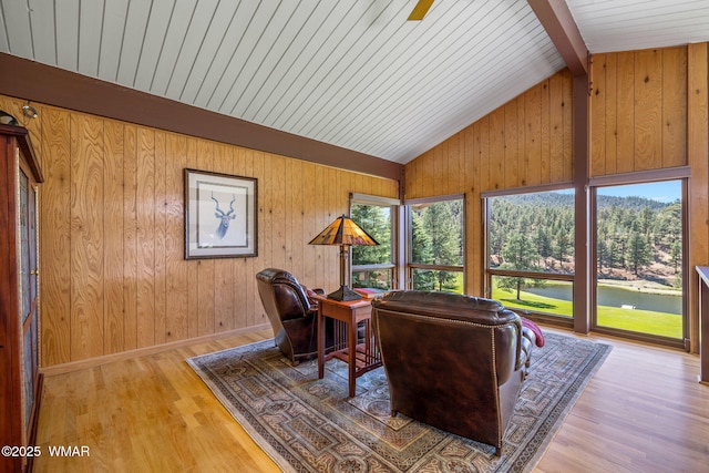 38684 State Route 373, Greer, AZ 85927 - living area featuring wooden walls, wood finished floors, and a water view