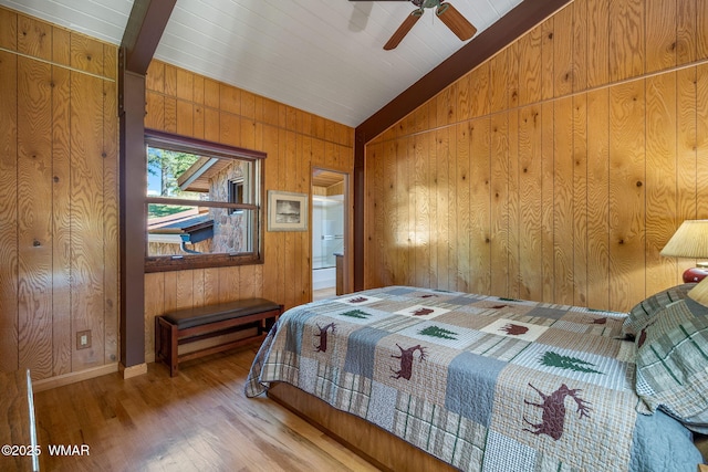 38684 State Route 373, Greer, AZ 85927 - bedroom with wooden walls, wood finished floors, and vaulted ceiling