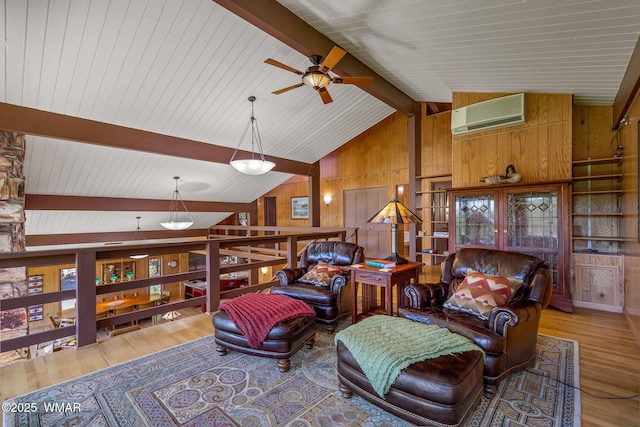 38684 State Route 373, Greer, AZ 85927 - living room featuring a wall unit AC, ceiling fan, wood walls, and wood finished floors