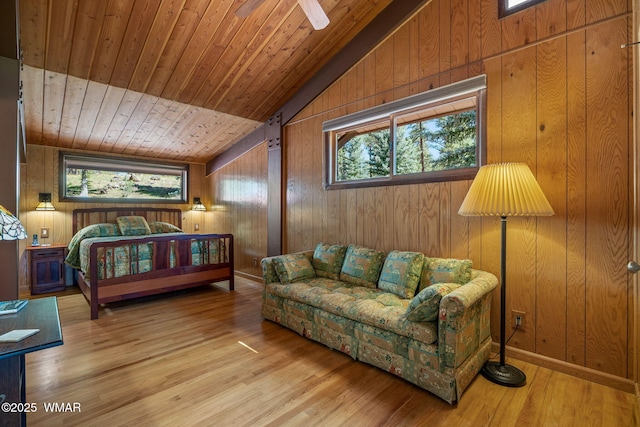 38684 State Route 373, Greer, AZ 85927 - bedroom with vaulted ceiling, multiple windows, wooden walls, wood finished floors, and wooden ceiling