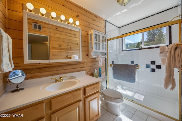 38684 State Route 373, Greer, AZ 85927 - full bath with wooden walls, tile patterned flooring, a shower stall, and vanity