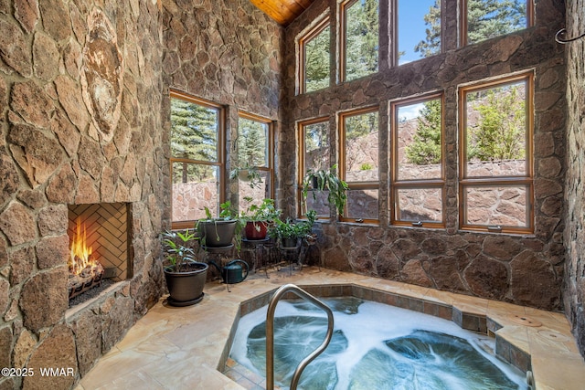 38684 State Route 373, Greer, AZ 85927 - sunroom / solarium with a hot tub and vaulted ceiling
