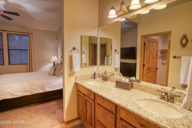 3240 W Black Oak Loop, Show Low, AZ 85901 - full bathroom with double vanity, ensuite bath, a sink, and a ceiling fan