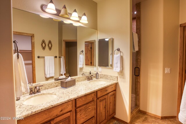 3240 W Black Oak Loop, Show Low, AZ 85901 - full bathroom featuring a stall shower, tile patterned floors, a sink, and double vanity