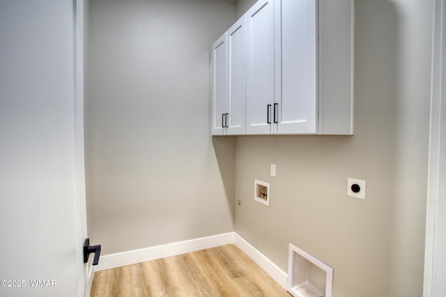 4696 W Tatanka Loop, Show Low, AZ 85901 - laundry area featuring hookup for an electric dryer, washer hookup, cabinet space, light wood finished floors, and baseboards
