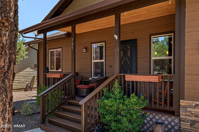 721 S Reynolds Ln, Show Low, AZ 85901 - doorway to property with covered porch