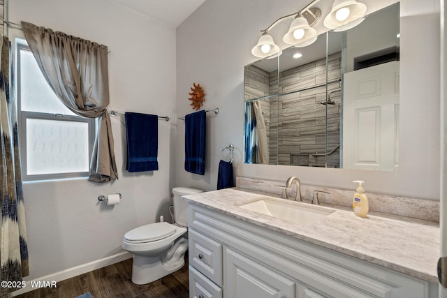 721 S Reynolds Ln, Show Low, AZ 85901 - full bathroom with vanity, a tile shower, and wood finished floors