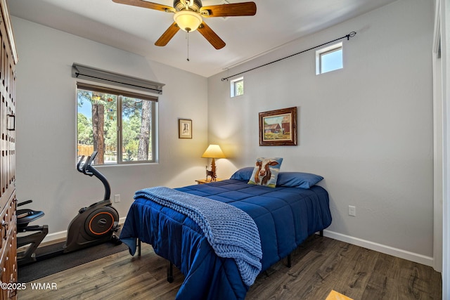 721 S Reynolds Ln, Show Low, AZ 85901 - bedroom featuring multiple windows, wood finished floors, and ceiling fan