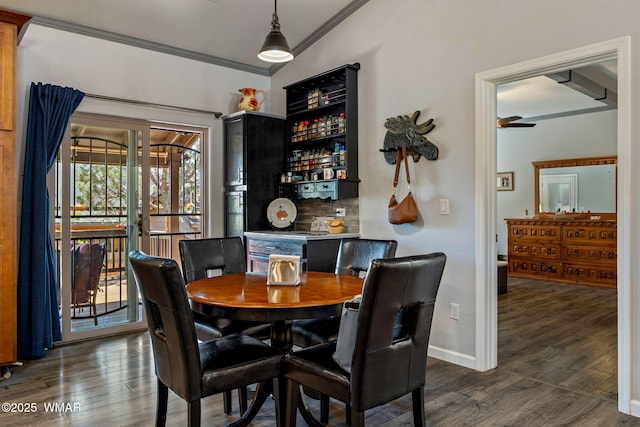 721 S Reynolds Ln, Show Low, AZ 85901 - dining area featuring a dry bar, crown molding, and dark wood-type flooring