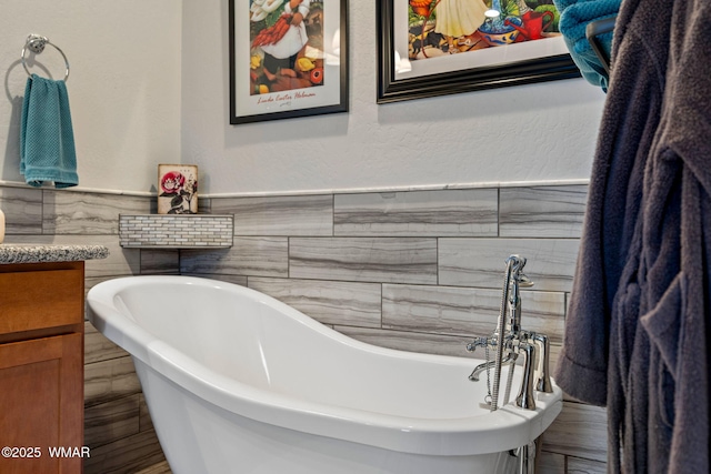 721 S Reynolds Ln, Show Low, AZ 85901 - bathroom featuring a freestanding bath and vanity