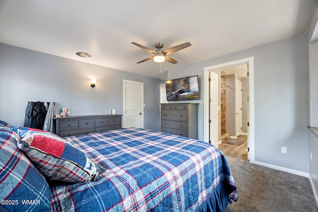 carpeted bedroom with baseboards, ceiling fan, and ensuite bath