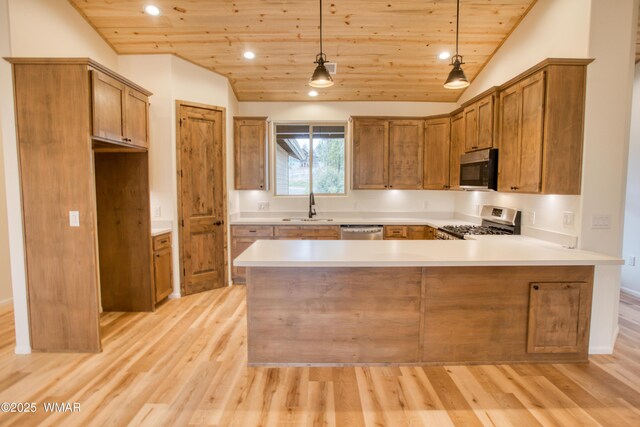 3360 W Mariposa Ln, Show Low, AZ 85901 - kitchen featuring appliances with stainless steel finishes, wood ceiling, a peninsula, light wood-style floors, and brown cabinetry