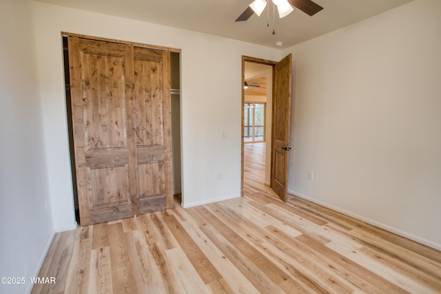 3360 W Mariposa Ln, Show Low, AZ 85901 - unfurnished bedroom with light wood-type flooring and a ceiling fan