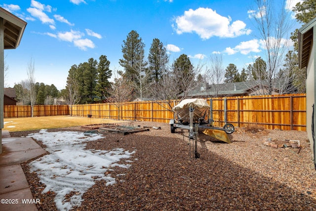 view of yard featuring a patio area and a fenced backyard