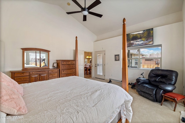 carpeted bedroom with high vaulted ceiling and a ceiling fan