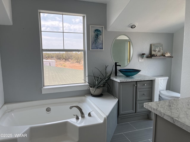 8515 Pueblo Ln, Snowflake, AZ 85937 - bathroom with vanity, a bath, tile patterned flooring, and a textured wall