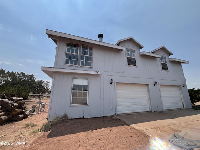 8515 Pueblo Ln, Snowflake, AZ 85937 - view of front of house with concrete driveway and a garage