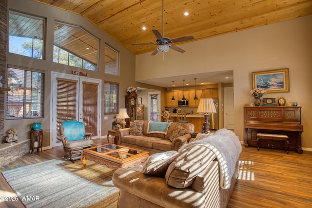 811 S Rockcress Ln, Show Low, AZ 85901 - living area with light wood-type flooring, wooden ceiling, recessed lighting, baseboards, and a ceiling fan