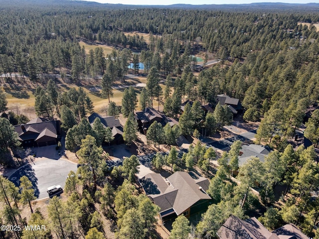 811 S Rockcress Ln, Show Low, AZ 85901 - aerial view of property and surrounding area featuring a heavily wooded area